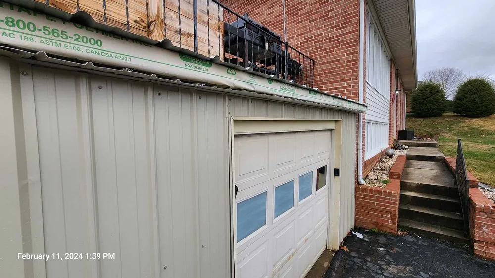 Slide of Whittsroofing