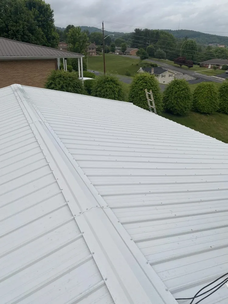 Slide of Whittsroofing