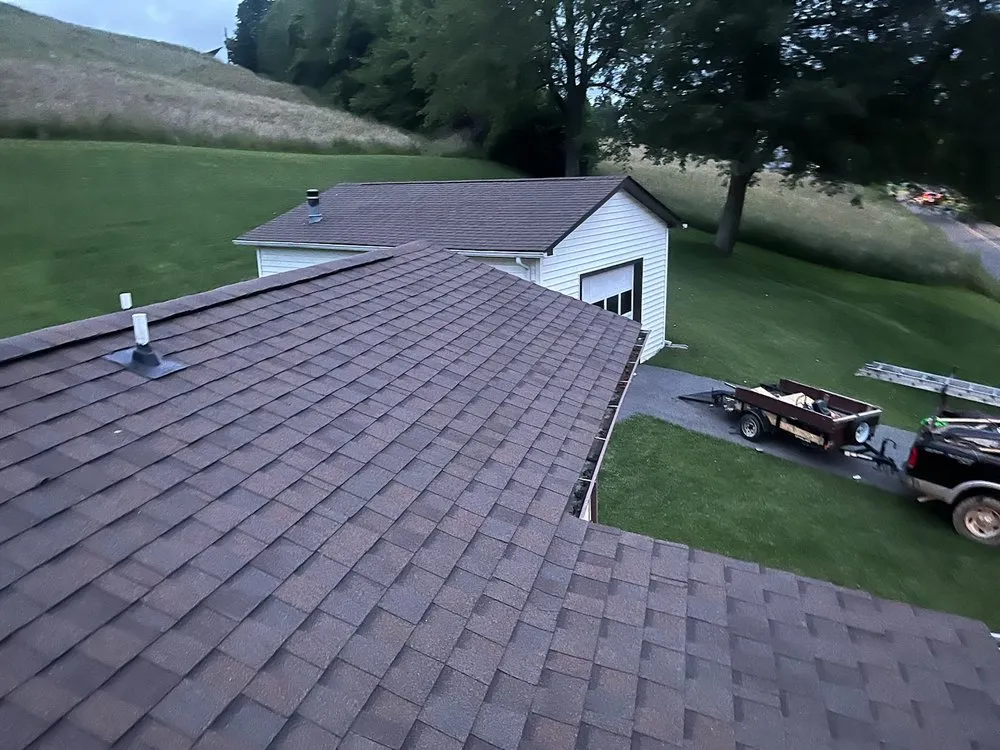 Slide of Whittsroofing