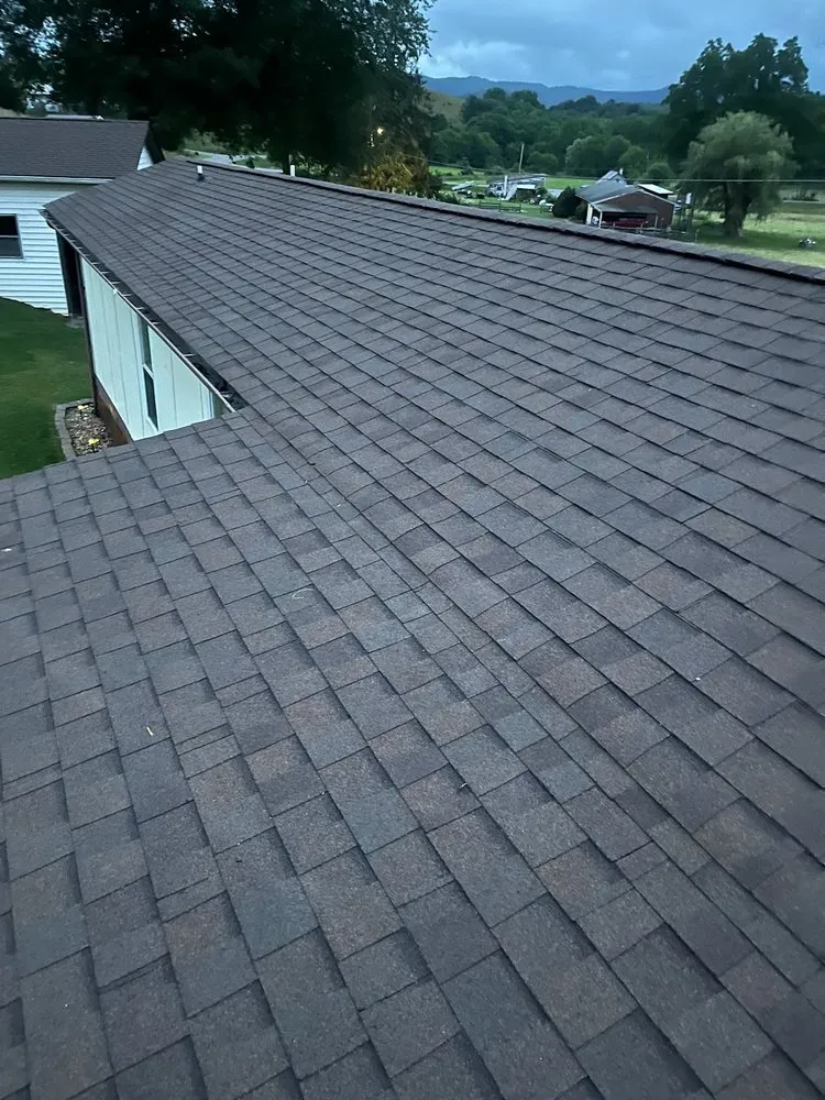 Slide of Whittsroofing