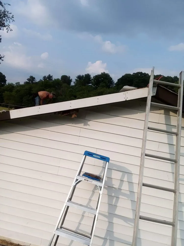 Slide of Whittsroofing