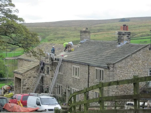 Slide of Wichita Roofing Contractors