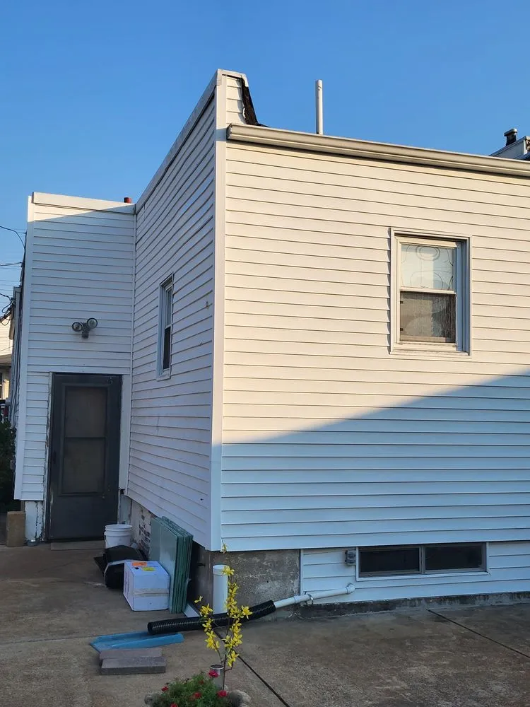 Slide of Wildwood Roofing & Construction