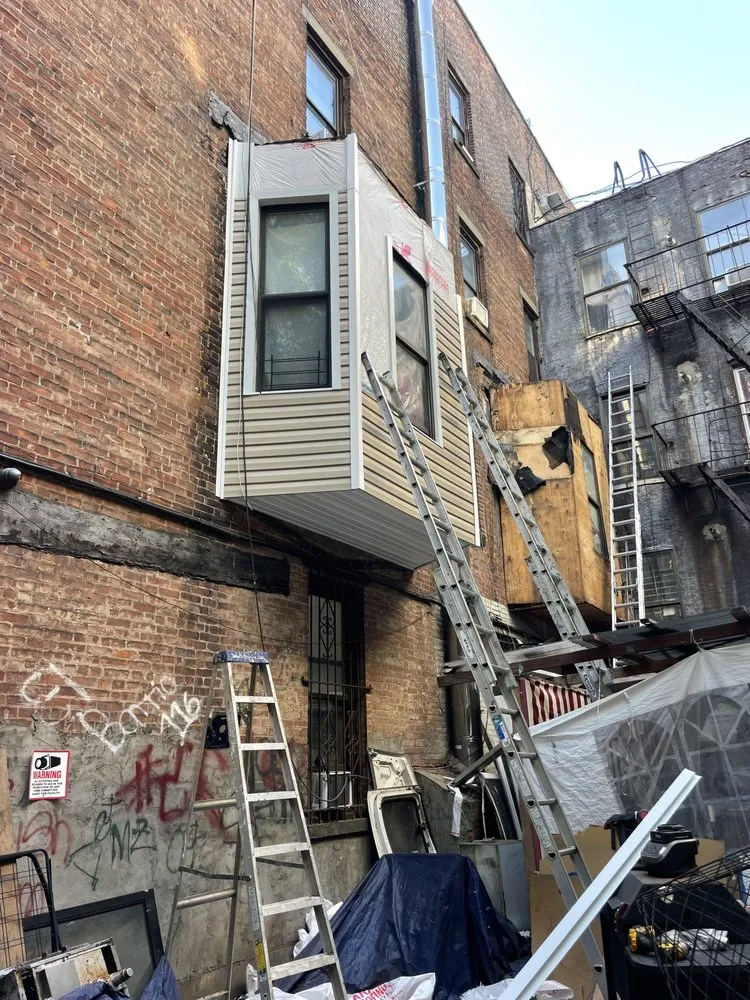 Licensed flat roof repair in Sunnyside, NY by William & Hugh Roofing