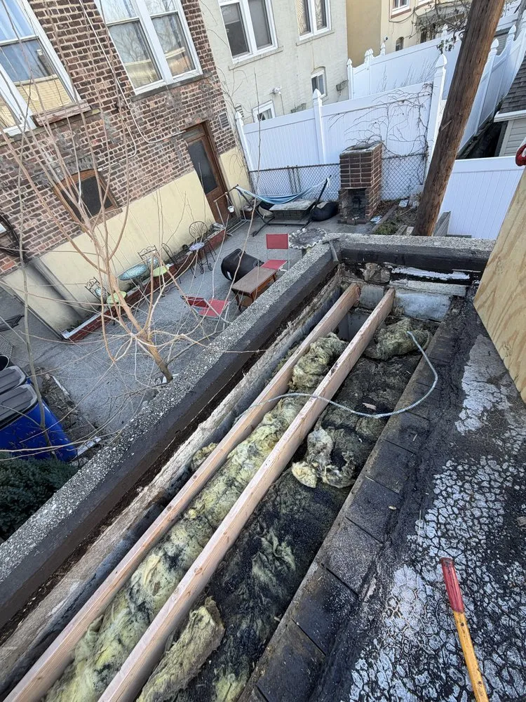 Emergency roof leak repair for residential properties in Sunnyside, NY by William & Hugh Roofing