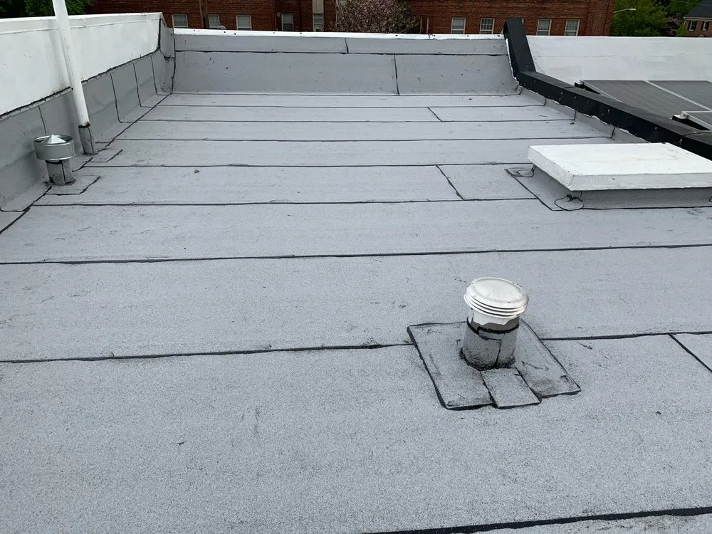 Slide of William Mackay Roofing