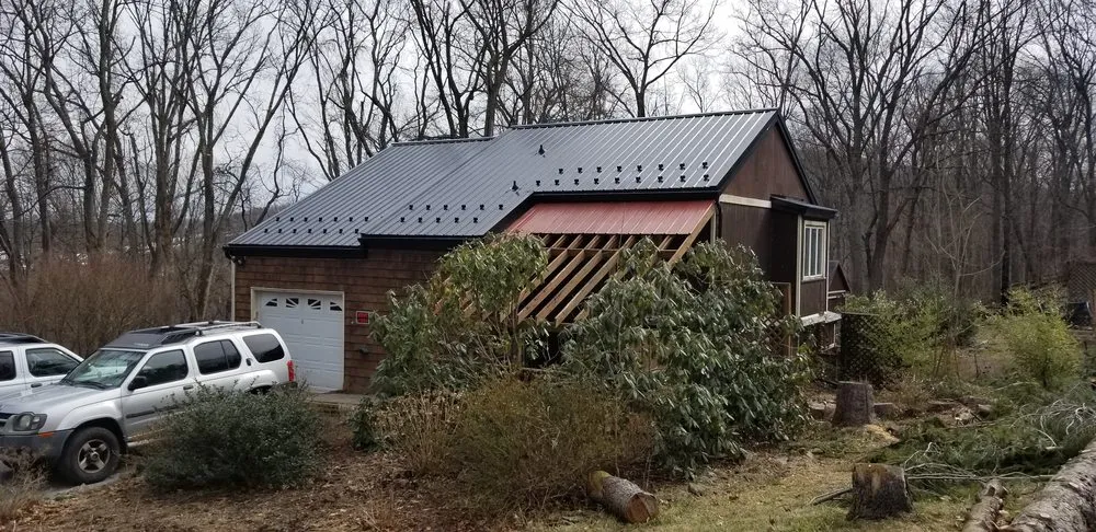 Reliable storm damage roof repair for homes in Shermans Dale, PA by William Penn Renovation
