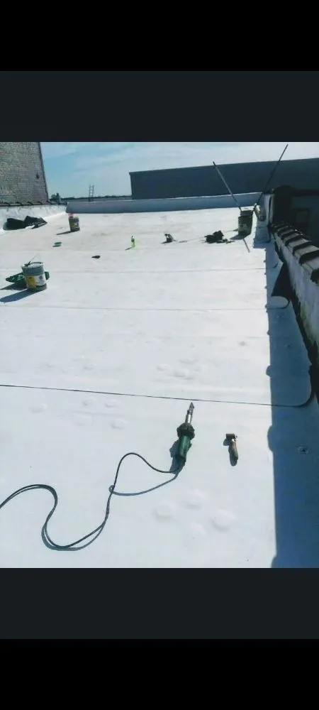 Slide of Williams & Sons Roofing