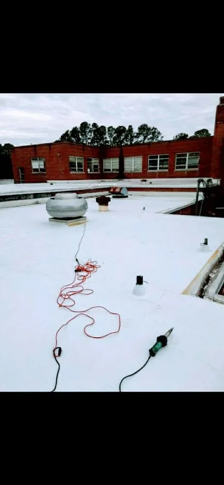 Slide of Williams & Sons Roofing