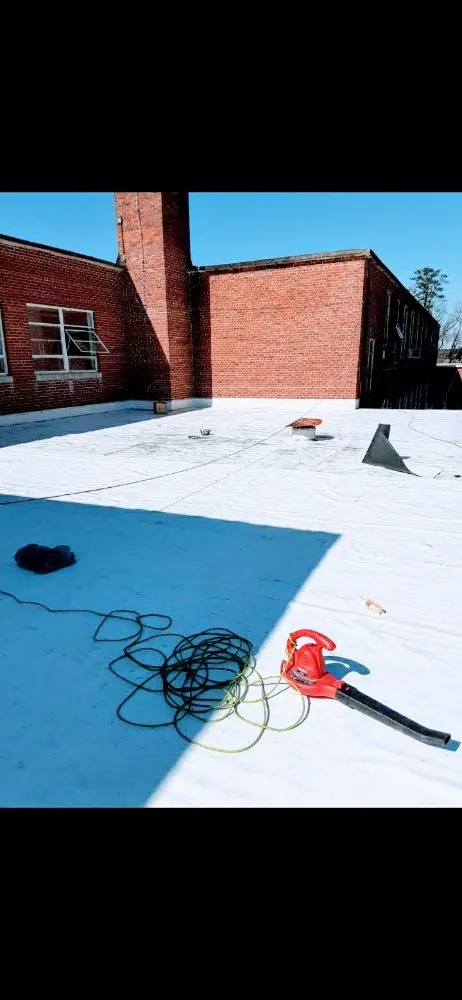 Slide of Williams & Sons Roofing