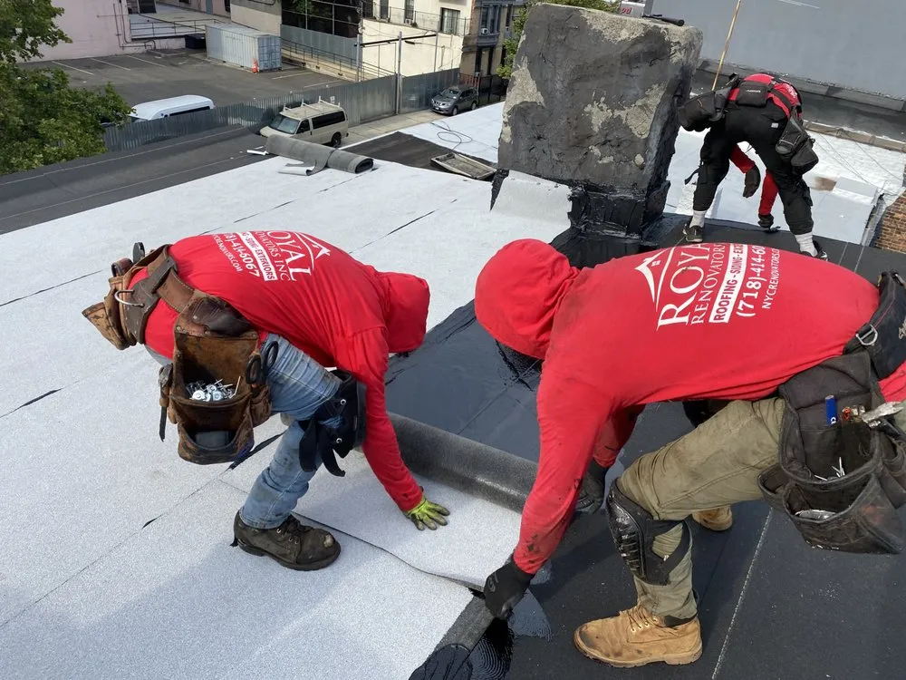 Local storm damage roof repair in Williamsburg, NY by Williamsburg Roofing