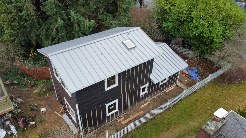 Slide of Will's Roofing Company