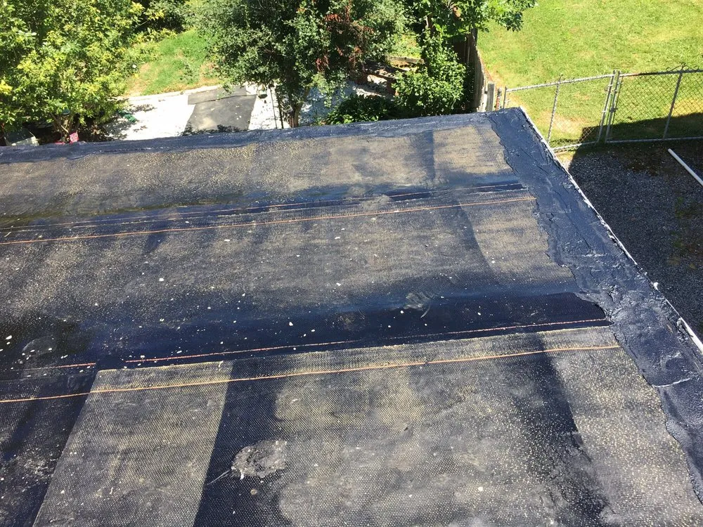 Slide of Wilmington City Roofing