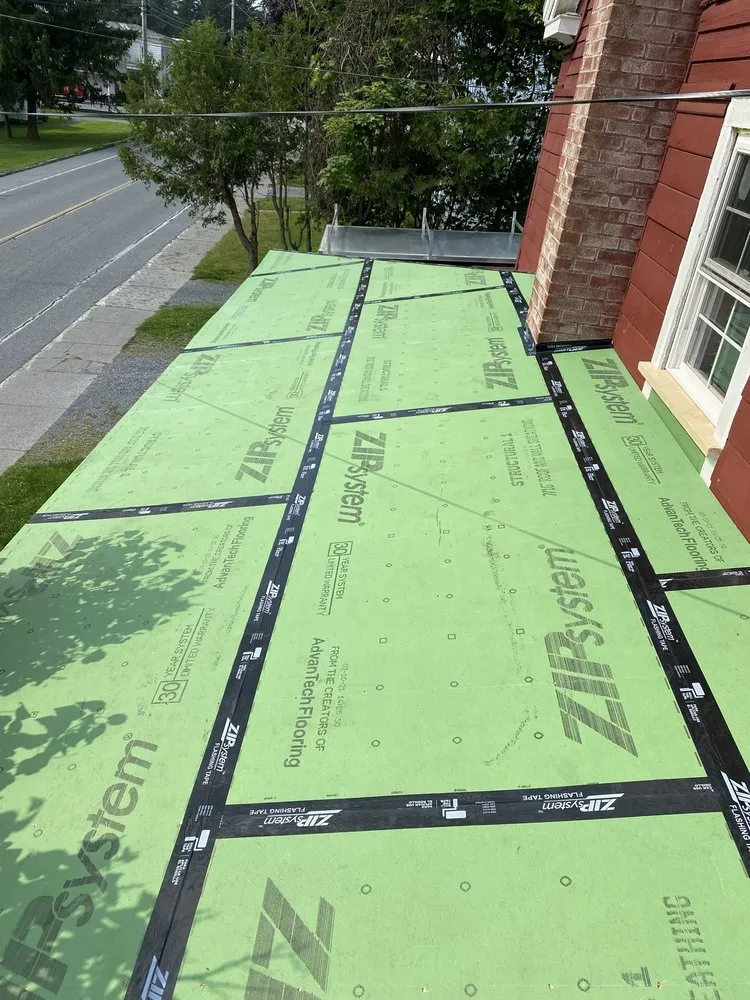 Slide of Wilson Roofing & Contracting