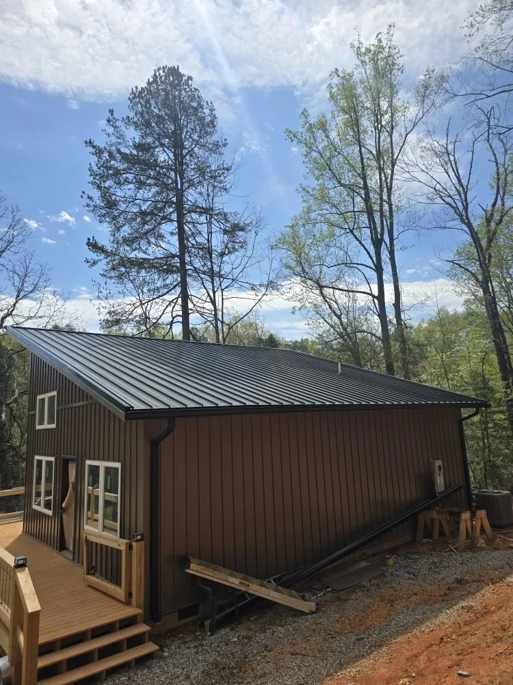 Slide of Wilson Seamless Gutters & Roofing