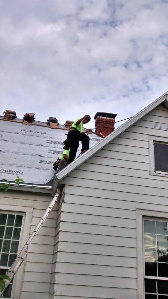 Slide of Wilson's Roofing Construction