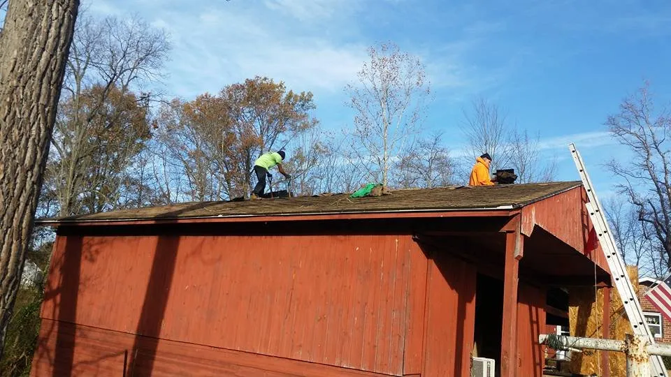 Slide of Wilson's Roofing Construction