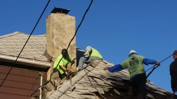 Slide of Wilson's Roofing Construction