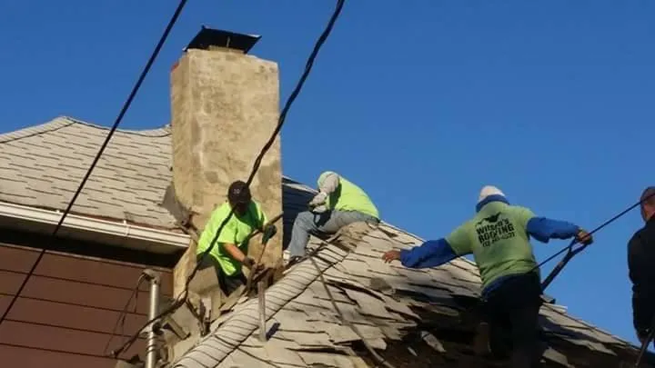 Slide of Wilson's Roofing Construction