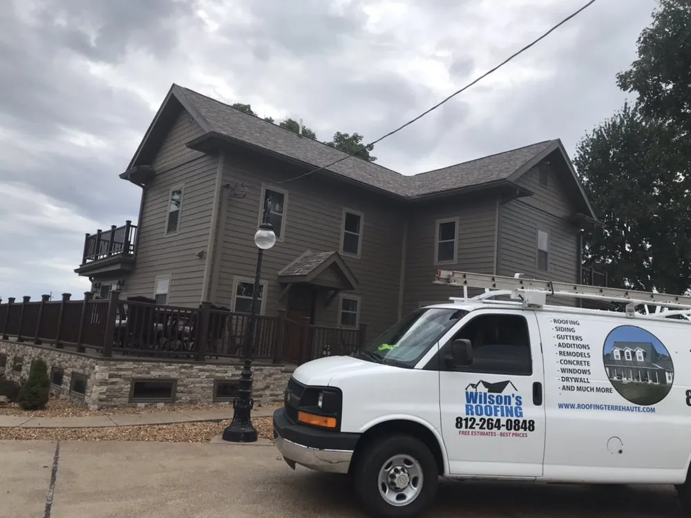 Slide of Wilson's Roofing Construction