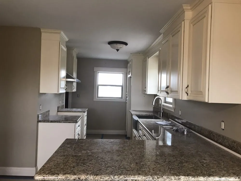 Slide of Wilson's Roofing Construction