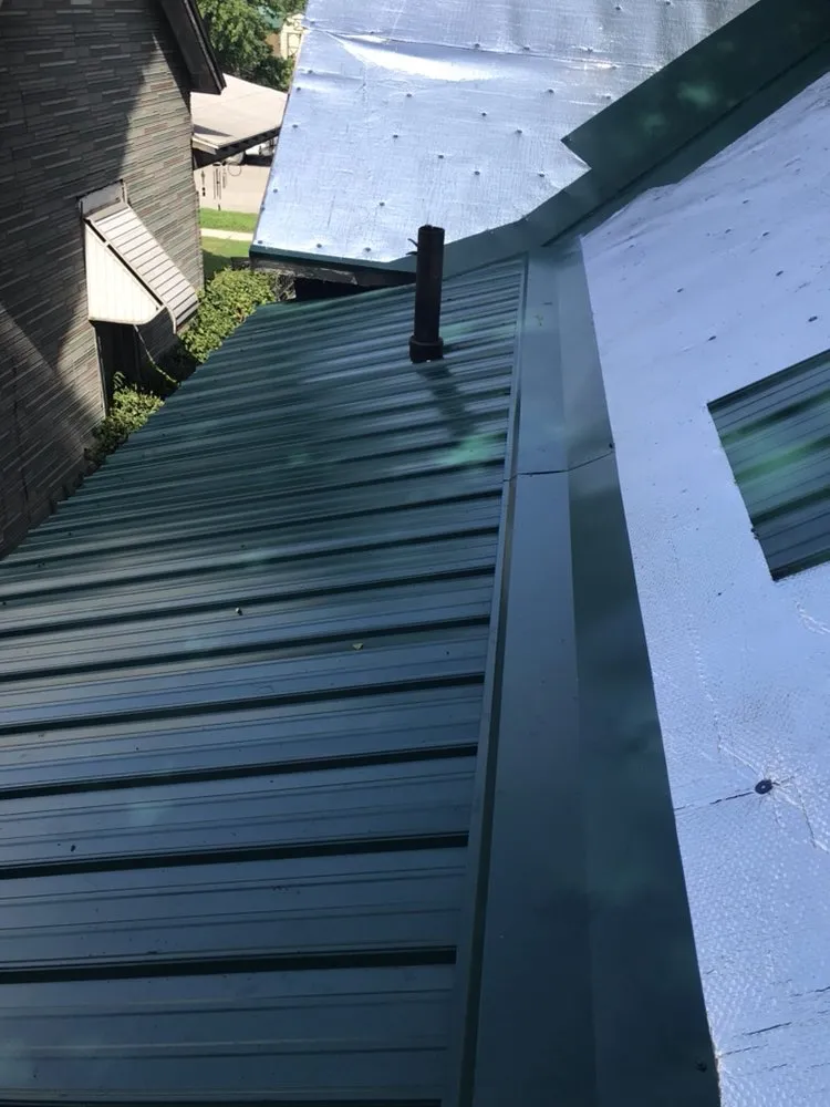 Slide of Wilson's Roofing Construction