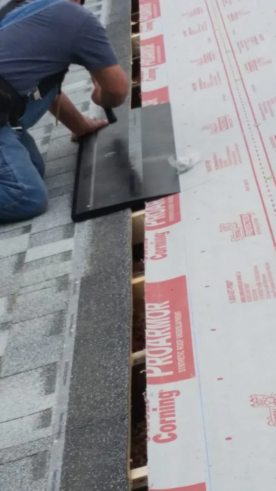 Slide of Wilson's Roofing Construction