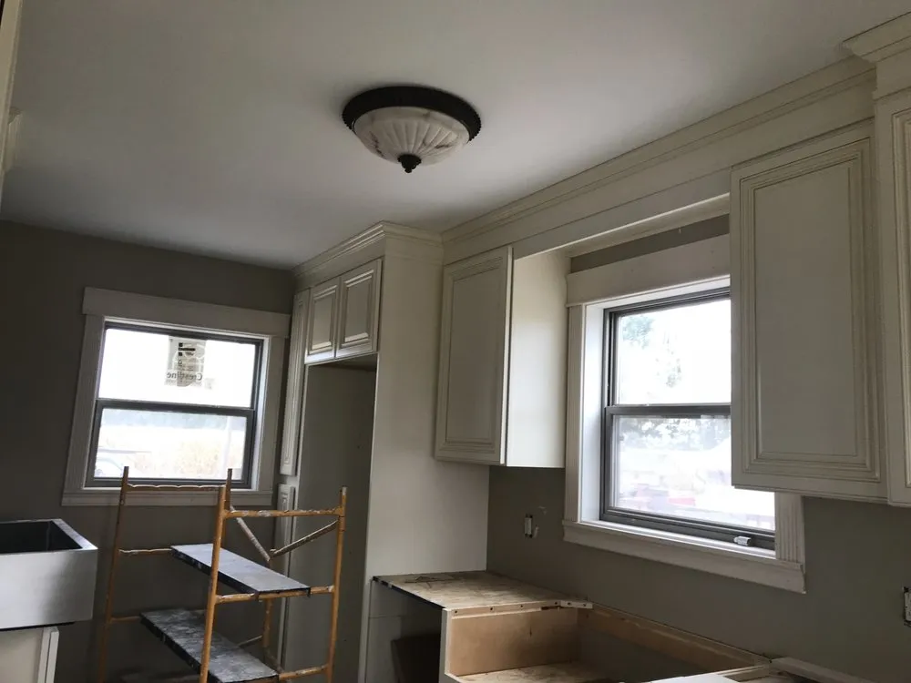 Slide of Wilson's Roofing Construction