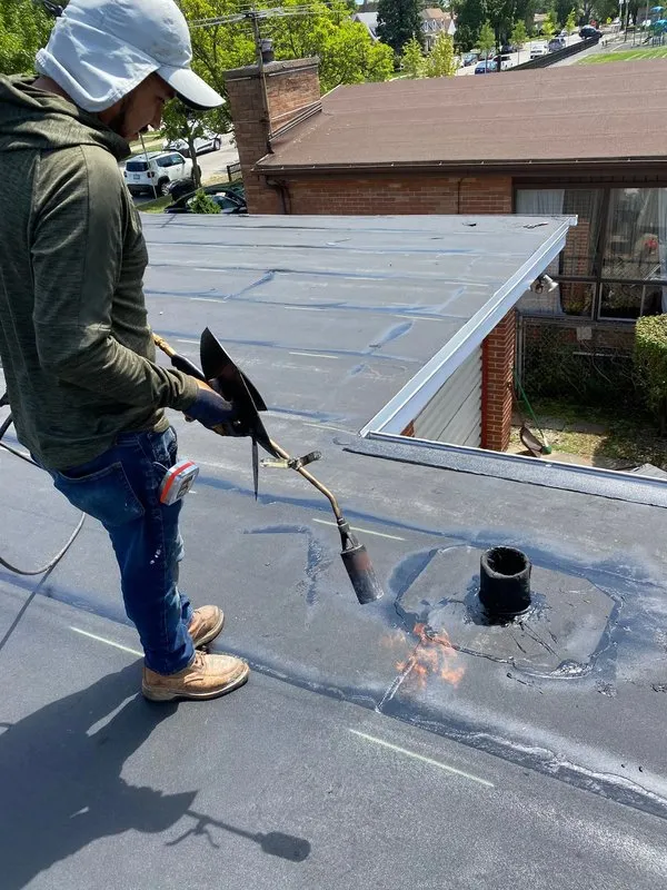 Slide of Windy City Flat Roof