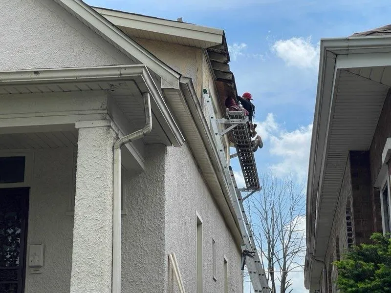 Slide of Windy City Roofing & Gutters