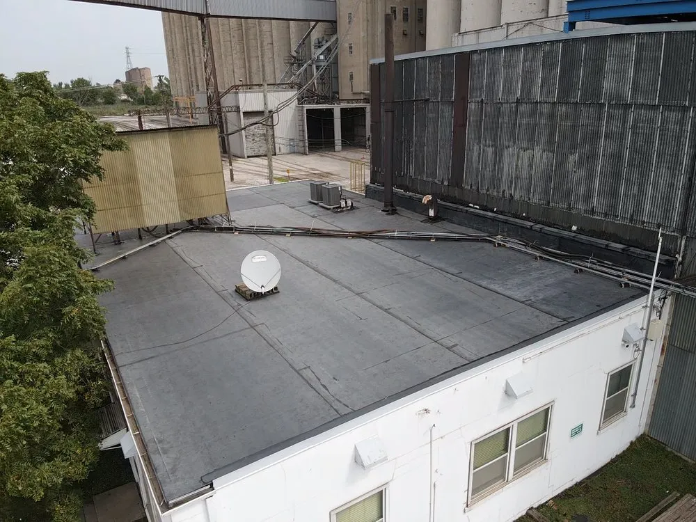 Slide of Windy City Roofing and Restoration Corp