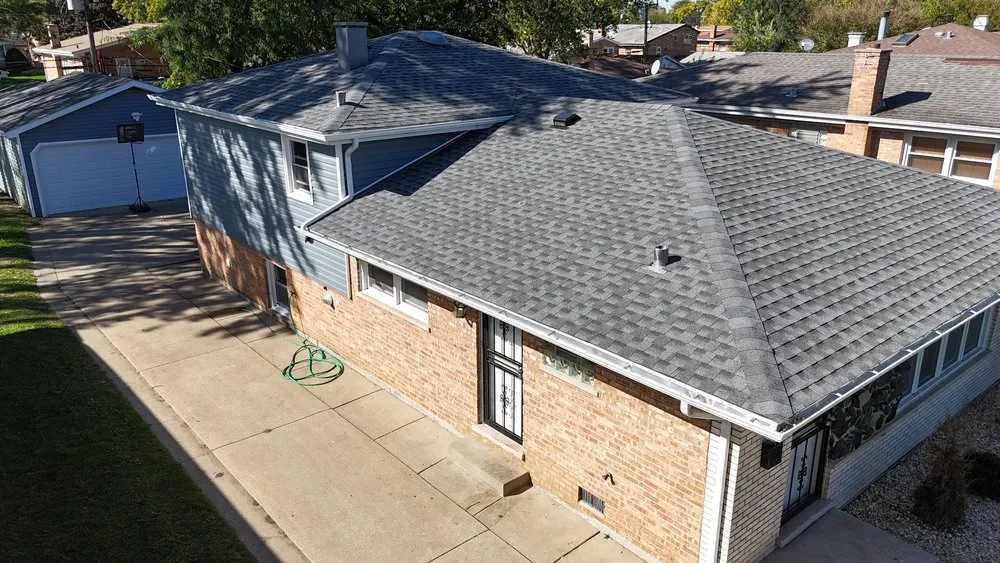 Slide of Windy City Roofing and Restoration Corp