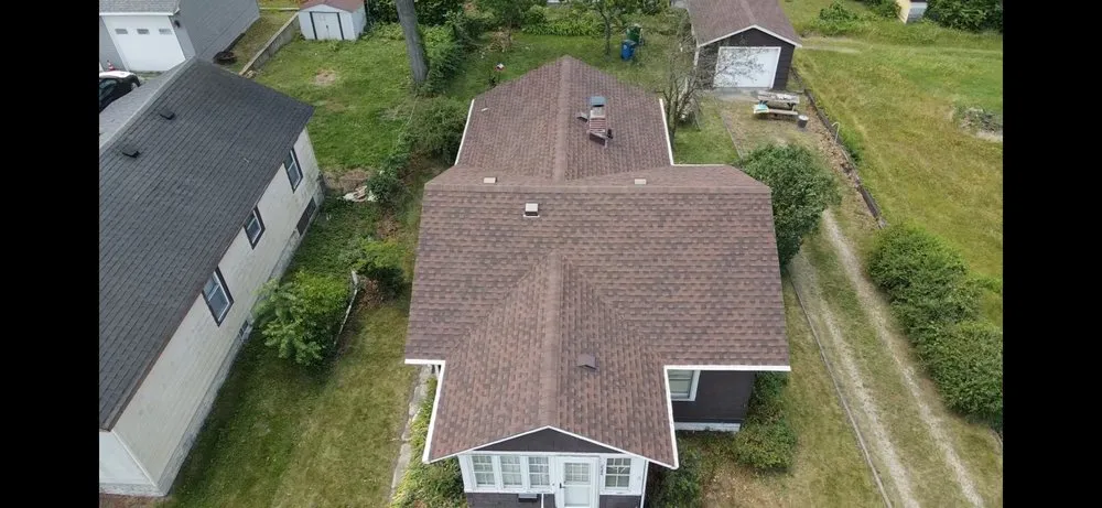 Slide of Windy City Roofing and Restoration Corp