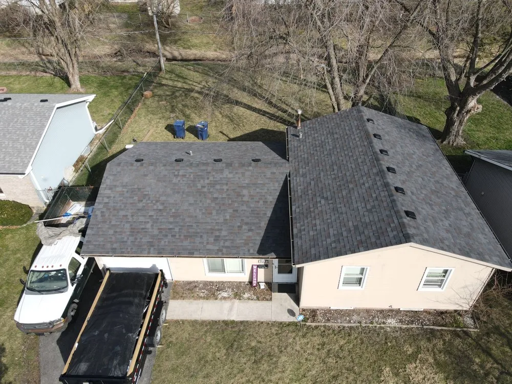 Slide of Windy City Roofing and Restoration Corp