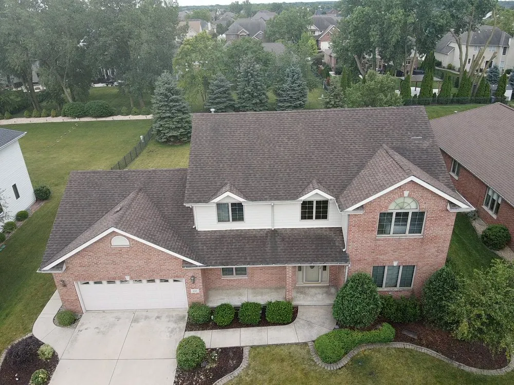 Slide of Windy City Roofing and Restoration Corp