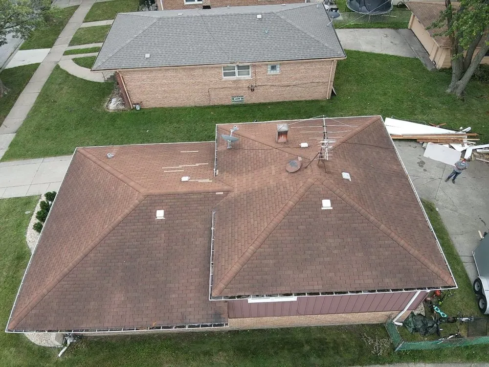 Slide of Windy City Roofing and Restoration Corp