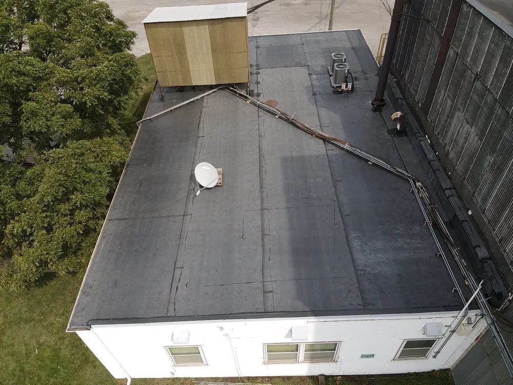 Slide of Windy City Roofing and Restoration Corp