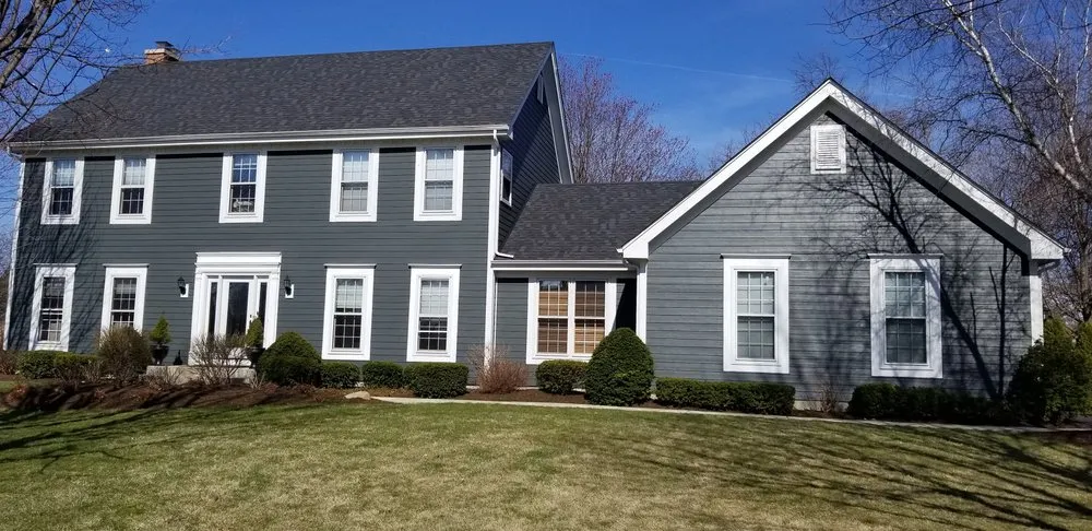 Slide of Windy City Roofing and Siding Contractors