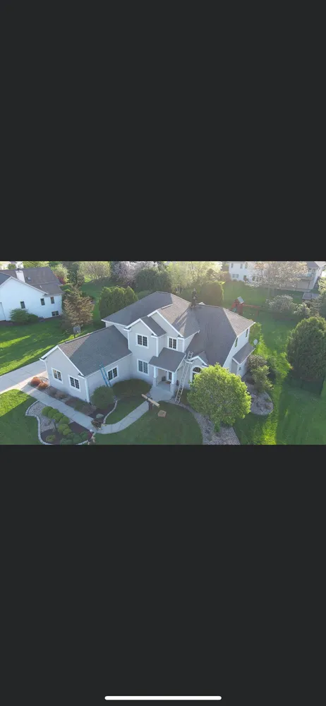 Slide of Wisconsin Quality Roofing