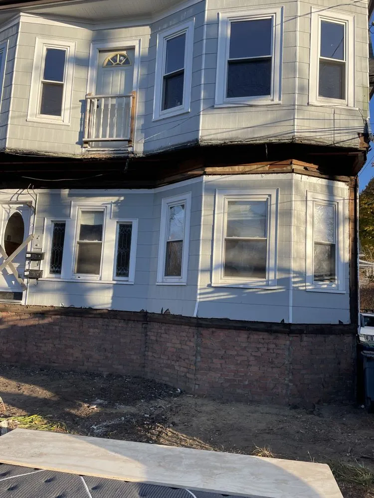 Slide of Wisdom Roofing