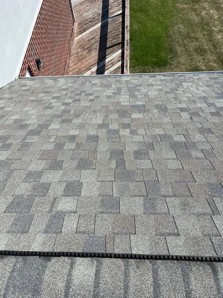 Slide of WIW Roofing