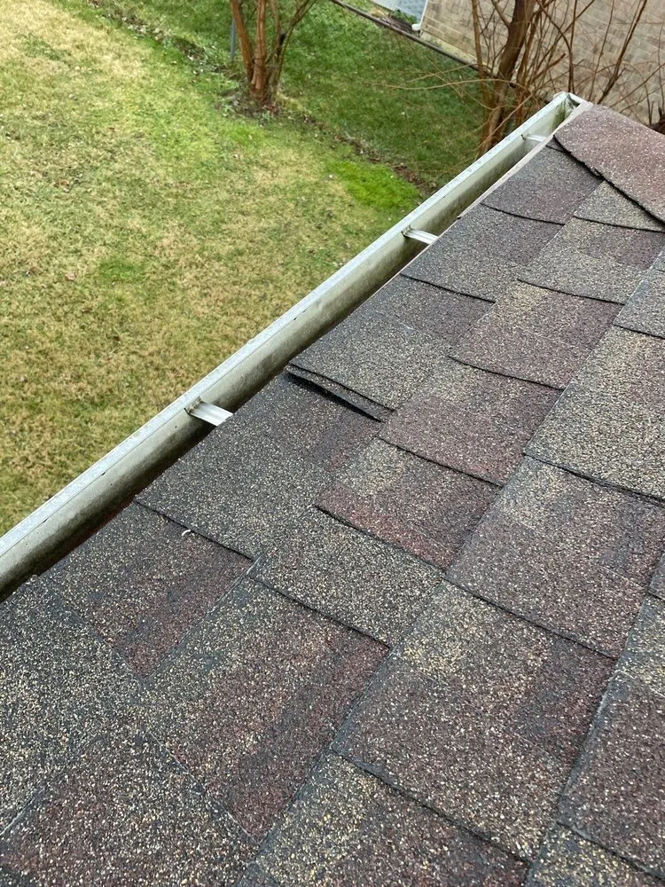 Slide of WIW Roofing