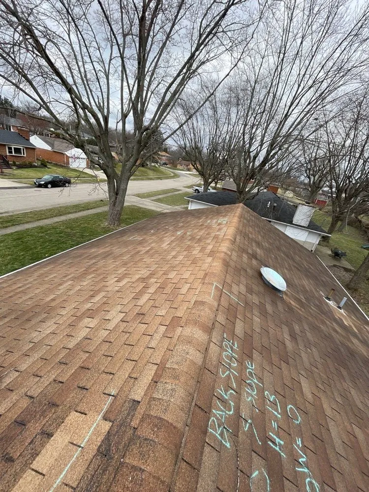 Slide of WIW Roofing