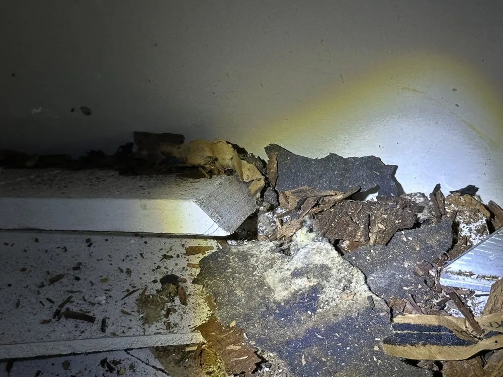 Slide of Wizard Roofing