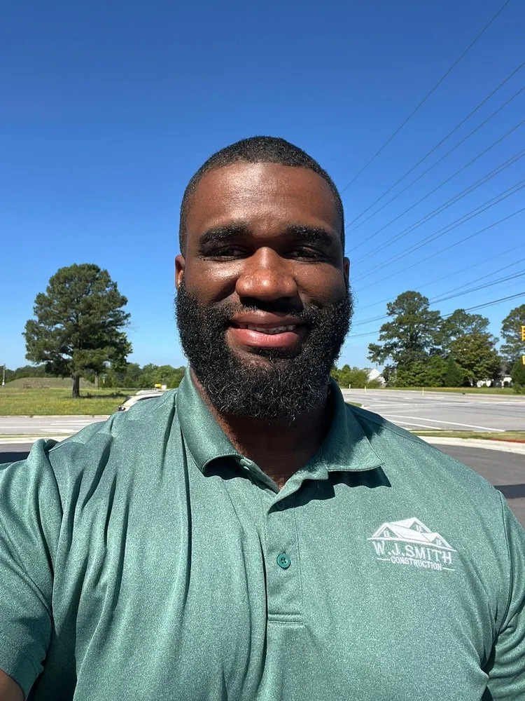 Slide of W.J Smith Construction Roofers