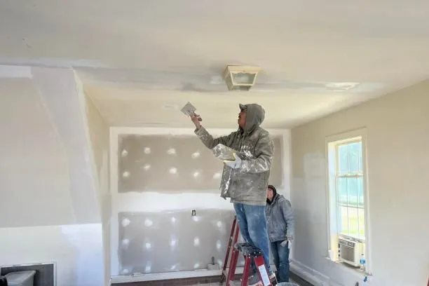 Slide of W.J Smith Construction Roofers