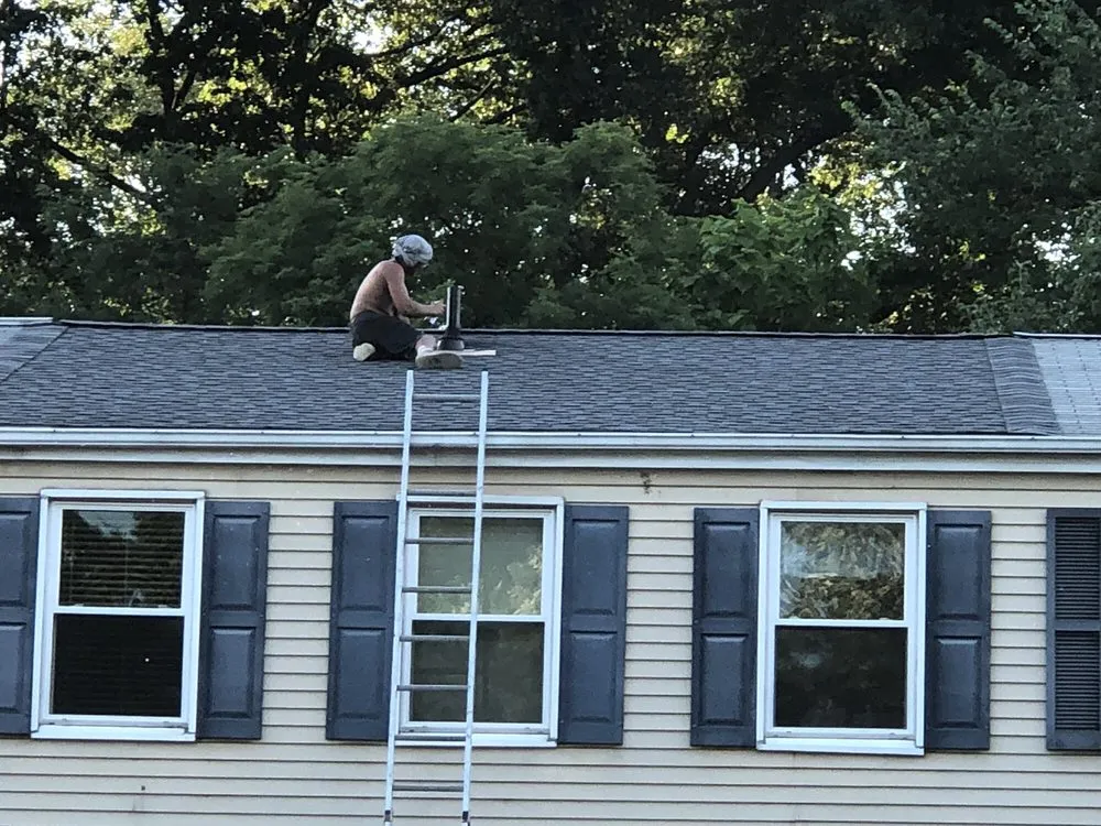 Slide of WM. Prescott Roofing & Remodeling