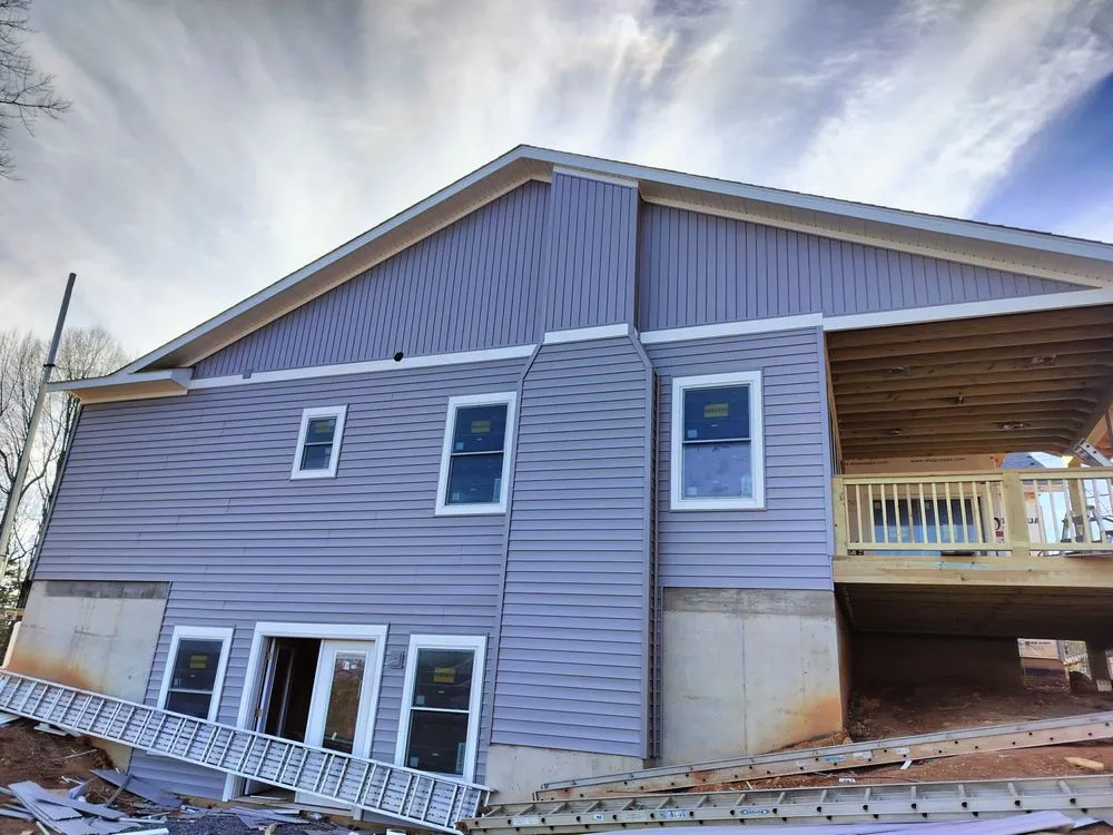 Slide of WM Siding and Roofing