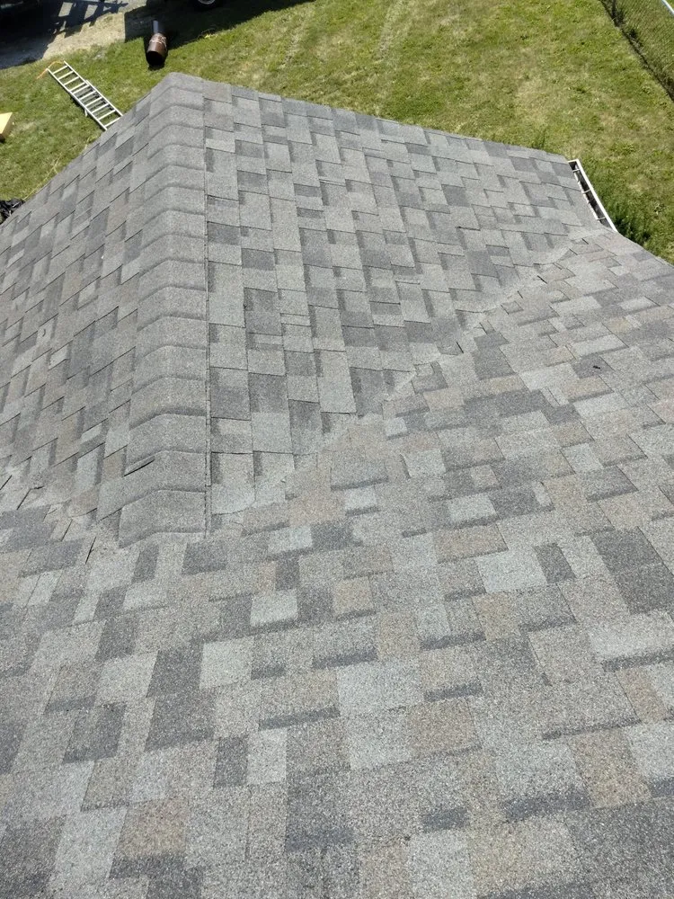 Slide of WM Siding and Roofing