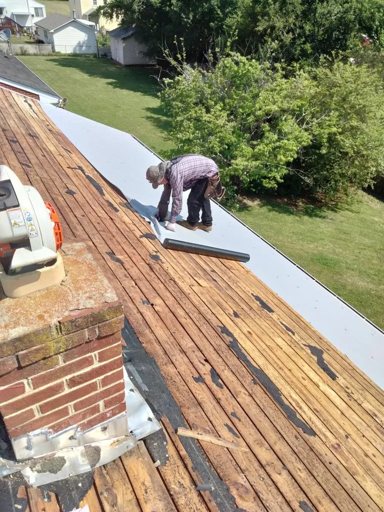 Slide of WM Siding and Roofing